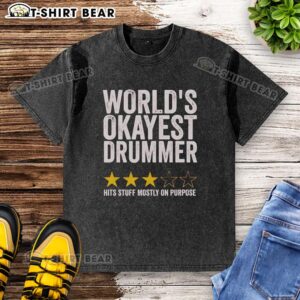 Alt Text: Original Worlds Okayest Drummer Hits Stuff Mostly On Purpose washed t-shirt featuring a playful drum graphic.