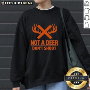 Top-Not-A-Deer-Dont-Shoot-Sweatshirt featuring a playful design, perfect for outdoor enthusiasts and hunters.