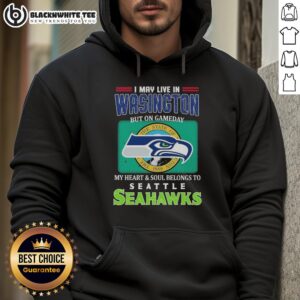 Alt Text: Cozy hoodie with 'I May Live In Washington But On Gameday My Heart & Soul Belongs To Seahawks' design, perfect for fans.