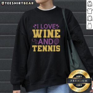 Cozy 'I Love Wine and Tennis' sweatshirt with stylish design, perfect for tennis lovers and wine enthusiasts.