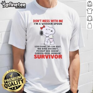 Alt Text: Funny Snoopy t-shirt reading 'Don't Mess With Me, I'm a Wooden Spoon Survivor' with lead paint, no car seat, no helmet.