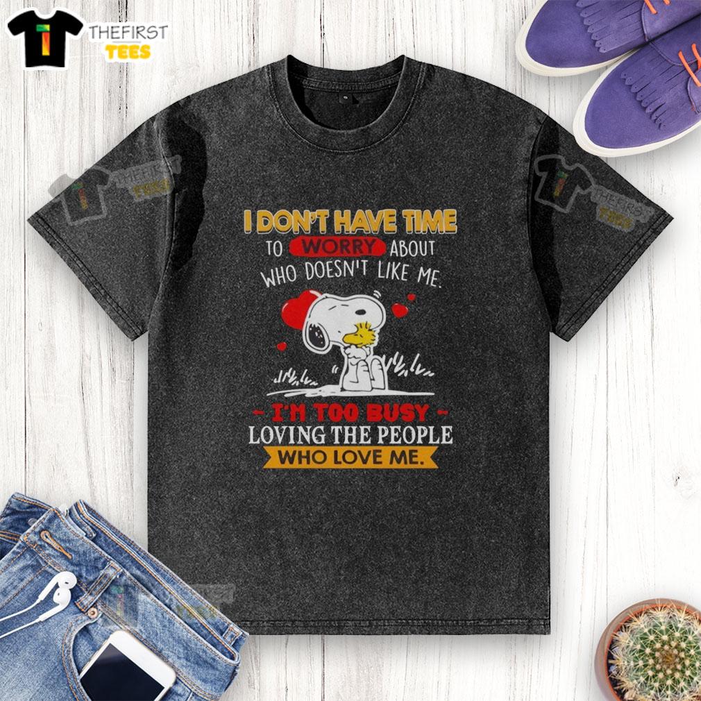 cute-snoopy-i-dont-have-time-to-worry-about-who-doesnt-like-me-im-too-busy-loving-sthe-people-washed-t-shirt Alt Text: Cute Snoopy t-shirt featuring I don't have time to worry about who doesn't like me design, perfect for fans.
