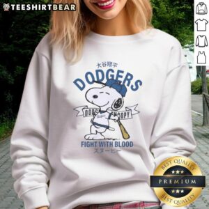 Awesome Peanuts Snoopy X Los Angeles Dodgers sweatshirt featuring Snoopy in a playful fight with vibrant colors.