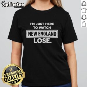 Vintage ladies tee featuring 'I'm Just Here To Watch New England Patriots Lose' design for football fans.