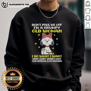 Grumpy old woman sweatshirt featuring Snoopy with 'Don't Piss Me Off' text, perfect for fans of humorous apparel.