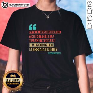Black woman wearing 'It's A Wonderful Thing To Be A Black Woman' tee by Nikki Giovanni, celebrating empowerment and pride.