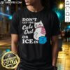 Funny anti-ice t-shirt featuring a humorous 'Don't Let The Cats Out Or Ice In' design for cat lovers and winter enthusiasts.