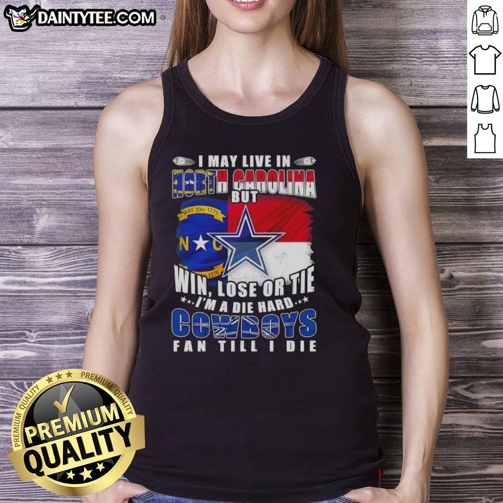 funny-i-may-live-in-north-carolina-but-im-a-die-hard-dallas-cowboys-fan-till-i-die-football-flag-tank-top Alt Text: Funny Dallas Cowboys fan tank top featuring a football flag design, perfect for North Carolina supporters.
