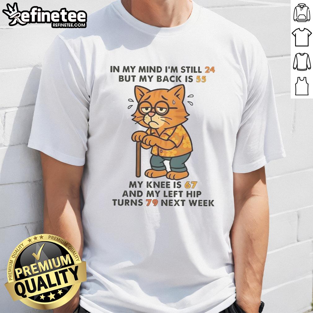 funny-in-my-mind-im-still-24-but-my-back-is-55-my-knee-is-67-and-my-left-hip-turns-79-next-week-cat-t-shirt Funny cat t-shirt design: 'In My Mind Im Still 24 But My Back Is 55' with humorous age references and playful graphics.