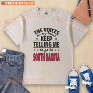 Funny washed t-shirt featuring 'The voices in my head keep telling me to go to South Dakota' graphic design.