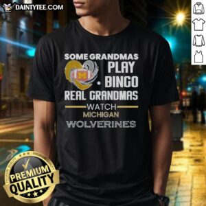 Awesome 'Some Grandmas Play Bingo, Real Grandmas Watch Michigan Wolverines' T-shirt featuring bold graphics.