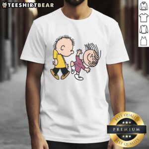 Alt Text: Official Peanuts Greatest Hits T-Shirt featuring Linus and Lucy design, perfect for fans of classic cartoons and music.