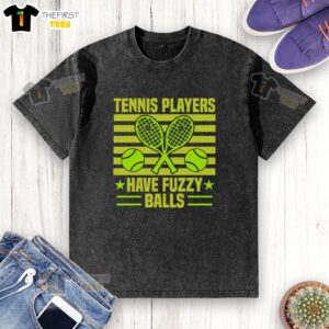 Funny tennis player wearing a washed T-shirt, humorously holding fuzzy balls on the court.