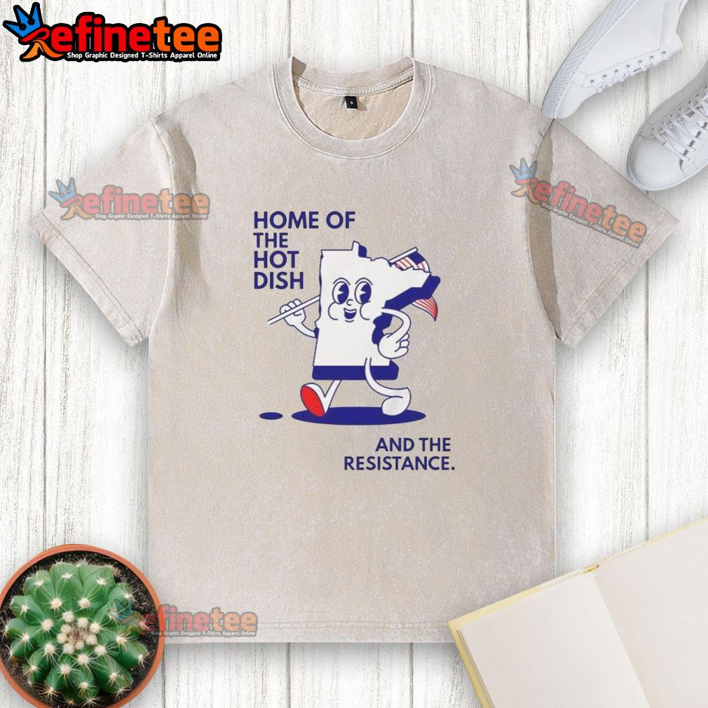 good-home-of-the-hot-dish-and-the-resistance-minnesota-map-holding-flag-washed-t-shirt Good Home of the Hot Dish Minnesota Map design on a washed t-shirt, featuring a flag and vibrant colors.