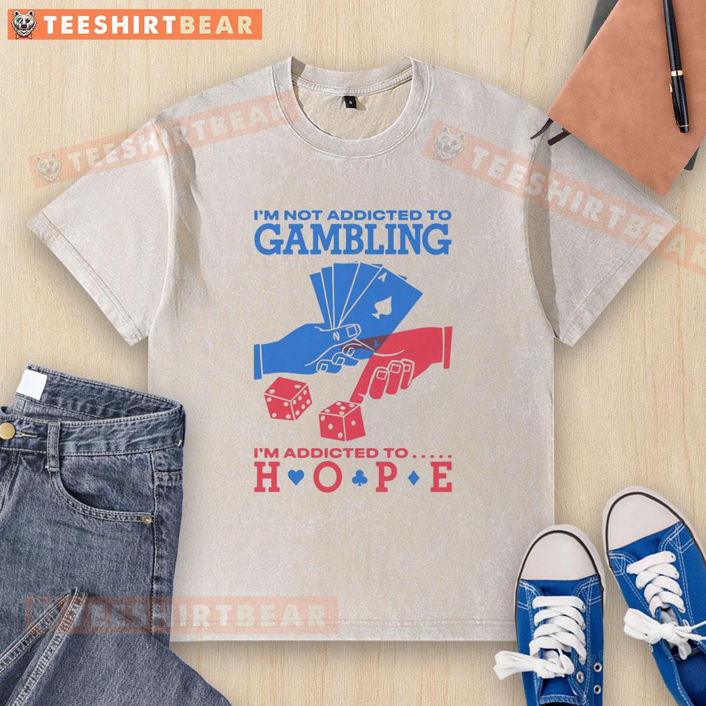 good-im-not-addicted-to-gambling-im-addicted-to-hope-washed-t-shirt Good I'm Not Addicted To Gambling, I'm Addicted To Hope T-Shirt featuring a bold, motivational design for gamblers.