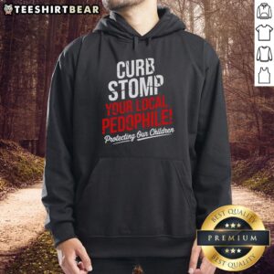 Top Curb Stomp Your Local Pedophile anti-pedophile hoodie showcasing bold design in a stylish urban setting.
