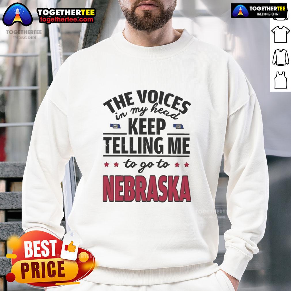 Hot The Voices In My Head Keep Telling Me To Go To Nebraska Sweatshirt Hot The Voices In My Head Keep Telling Me To Go To Nebraska sweatshirt in a cozy setting, perfect for casual wear.