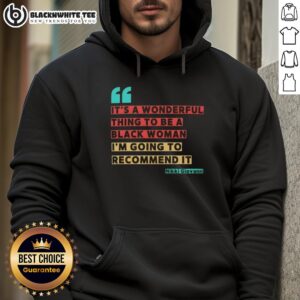 Black woman wearing 'It's A Wonderful Thing To Be A Black Woman' hoodie by Nikki Giovanni, showcasing empowerment and pride.