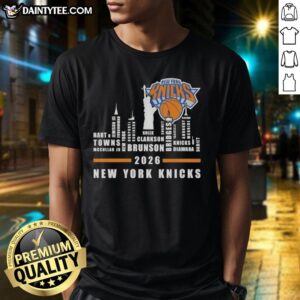2026 New York Knicks skyline T-shirt showcasing team names and iconic city landmarks in vibrant colors.