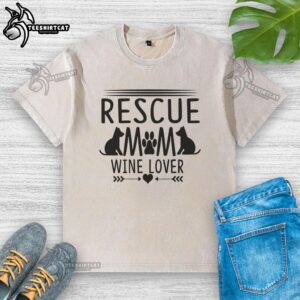 Hot rescue mom in a washed t-shirt, enjoying wine with her rescue dog, showcasing love for pets and wine.