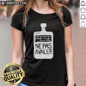 Thom Yorke wearing a 'Presse Ne Pas Avaler' ladies tee, showcasing his unique style and fashion sense.