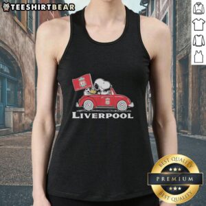 Alt Text: Snoopy and Woodstock driving a Liverpool FC red car while raising a flag, featured on a stylish tank top.