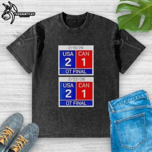 Premium 'Just American Hockey' Scoreboard T-Shirt featuring USA 2 - Canada 1 OT Final score, perfect for hockey fans.