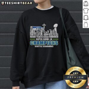 Seattle Seahawks Super Bowl LX Champions trophy sweatshirt featuring city skyline and all player names.