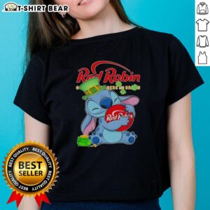 Pretty Stitch Hug the Red Robin logo on a Happy St. Patrick's Day ladies tee, perfect for festive celebrations.