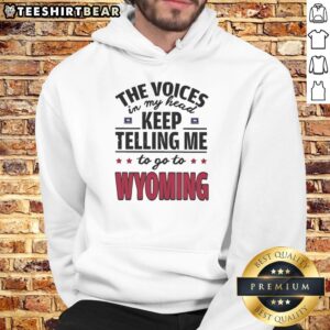Funny hoodie featuring 'The Voices In My Head Keep Telling Me To Go To Wyoming' design, perfect for casual wear.
