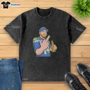 Pretty cartoon of Sam Darnold giving the middle finger on a washed t-shirt, showcasing a bold and playful design.
