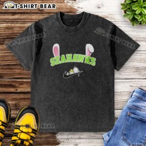 Alt Text: Pretty Seattle Seahawks X Snoopy Happy Easter washed t-shirt featuring vibrant designs and festive colors for fans.