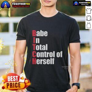 Alt Text: Stylish woman wearing 'Top Babe In Total Control Of Herself' red text t-shirt, showcasing confidence and attitude.