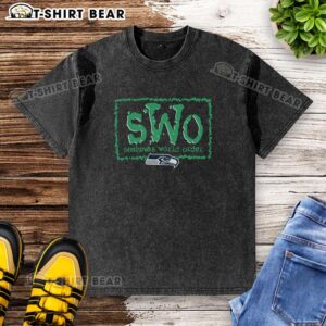 Pretty NWO X Seattle Seahawks washed t-shirt featuring a vintage design and team colors, perfect for fans.