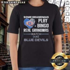Real grandmas cheer for the Duke Blue Devils in stylish ladies tee while playing bingo, showcasing a fun game night.