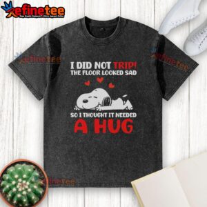 Nice Snoopy t-shirt featuring a humorous quote about tripping and hugging the floor, perfect for casual and playful wear.