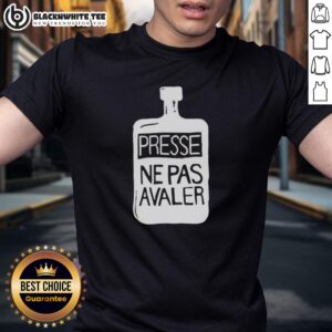 Thom Yorke wearing a Presse Ne Pas Avaler t-shirt, showcasing his unique style and fashion sense in a candid moment.