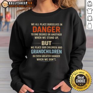 Premium We All Place Ourselves In Danger Sweatshirt - stylish and comfortable, perfect for everyday wear.