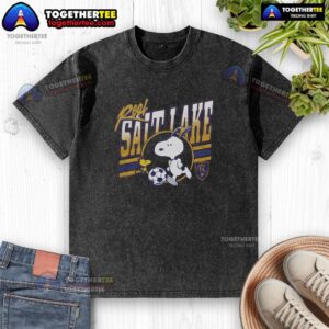 Alt Text: Awesome Peanuts Snoopy X Real Salt Lake washed t-shirt featuring Snoopy and team logo in vibrant colors.