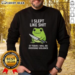 Alt Text: Funny Nice Grumpy Tired Frog Choosing Violence Sweatshirt design with a cartoon frog expressing mixed emotions.