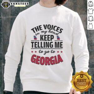 Funny sweatshirt featuring the phrase 'The Voices In My Head Keep Telling Me To Go To Georgia' for quirky fashion lovers.