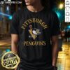 Nice Feathers McGraw Pittsburgh Penguins logo t-shirt featuring vibrant colors and playful design for hockey fans.