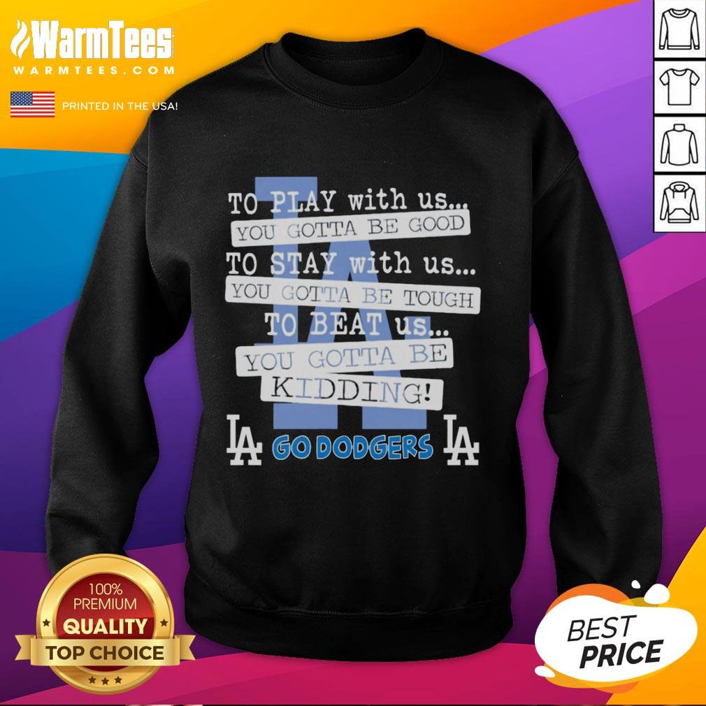 nice-go-los-angeles-dodgers-to-play-with-us-you-gotta-be-good-sweatshirt Alt Text: Cozy sweatshirt featuring Nice Go Los Angeles Dodgers design, perfect for fans to showcase their team spirit.