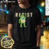 Nice Resist Portland Frog Caricature T-Shirt featuring a vibrant frog design promoting positivity and creativity.