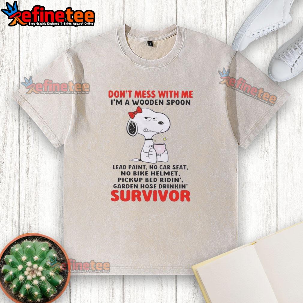 nice-snoopy-dont-mess-with-me-im-a-wooden-spoon-lead-paint-no-car-seat-no-bike-helmet-survivor-washed-t-shirt Snoopy graphic t-shirt reading 'Don't Mess With Me I'm A Wooden Spoon Survivor' with playful design and vibrant colors.