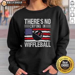 Funny 'There's No Crying in Wiffleball' sweatshirt worn by a player, showcasing humor and love for the game.