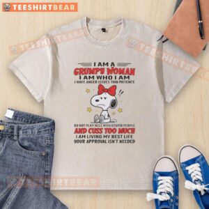 Alt Text: Grumpy woman wearing 'I Have Anger Issues' washed t-shirt, showcasing her thin patience and bold attitude.