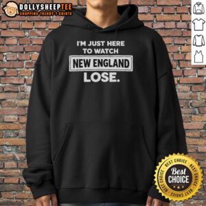 Vintage hoodie with 'I'm Just Here To Watch New England Patriots Lose' design, perfect for fans and sports enthusiasts.