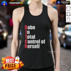 Confident woman wearing a red tank top with 'Top Babe In Total Control Of Herself' text, showcasing empowerment and style.