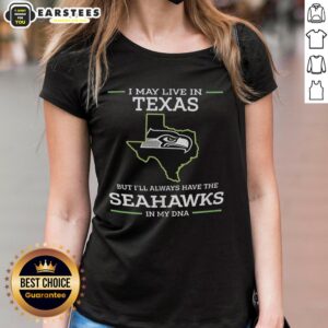 Funny ladies tee featuring 'I May Live In Texas But Ill Always Have The Seahawks In My DNA' design.